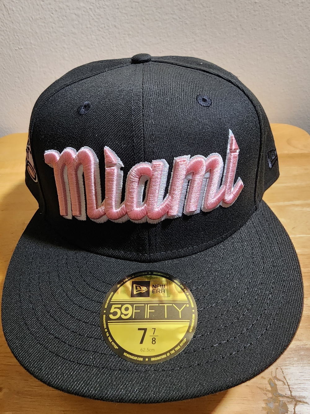 Miami Marlins New Era Black-on-Black 59FIFTY Fitted Hat Pink Team Embroided Logo